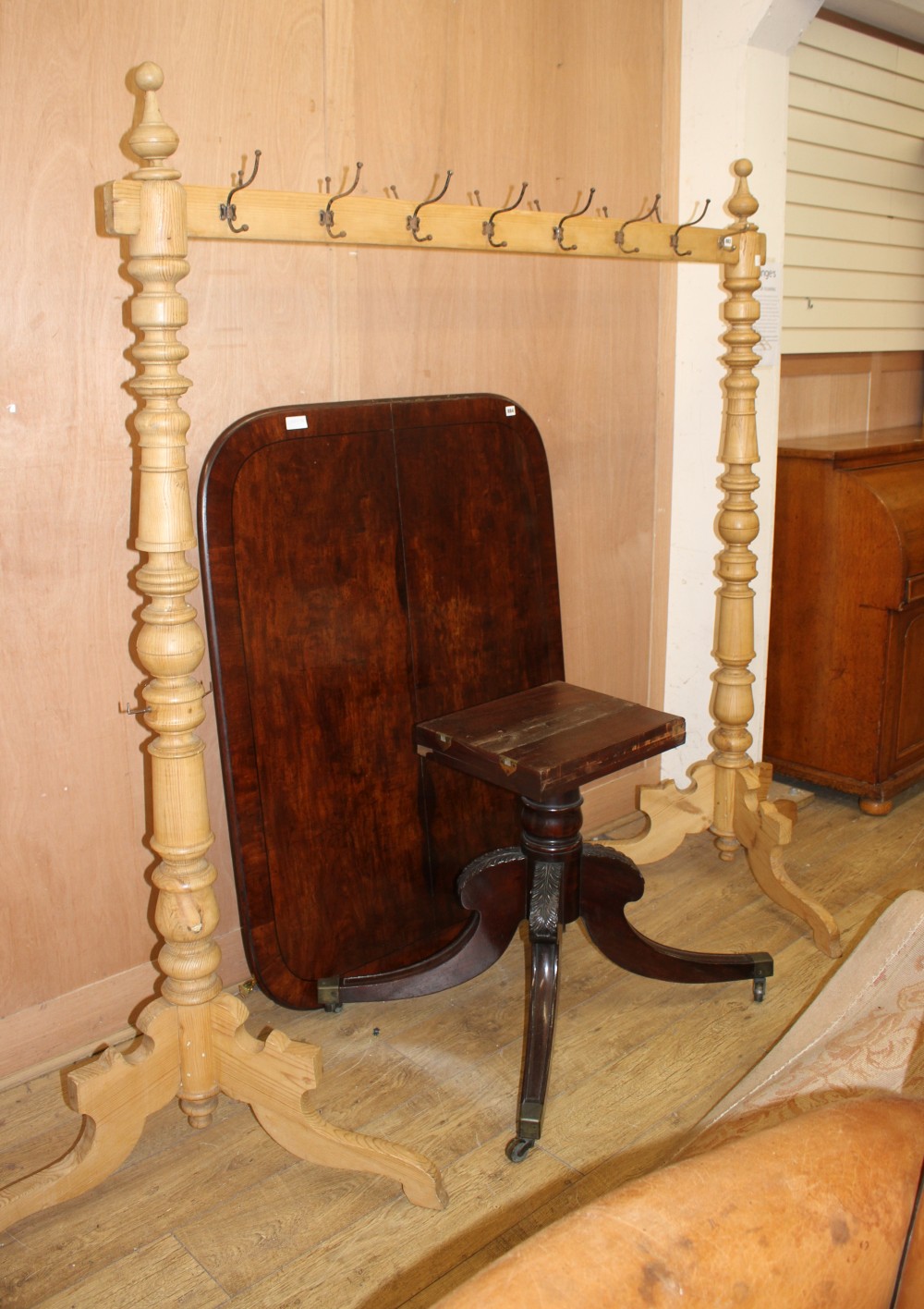 A large turned pine coat rack, W.250cm H.190cm